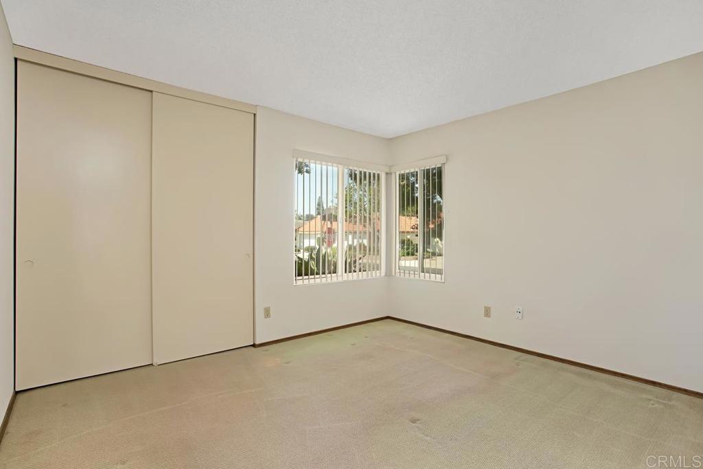 4202 Dawn Lane Oceanside, CA 92056 - Photo 11 of 23 an empty room with windows