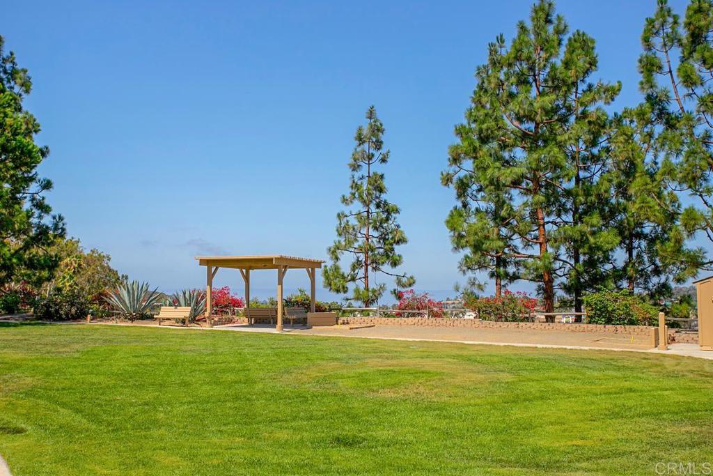 4202 Dawn Lane Oceanside, CA 92056 - Photo 17 of 23 a view of outdoor space with garden and trees