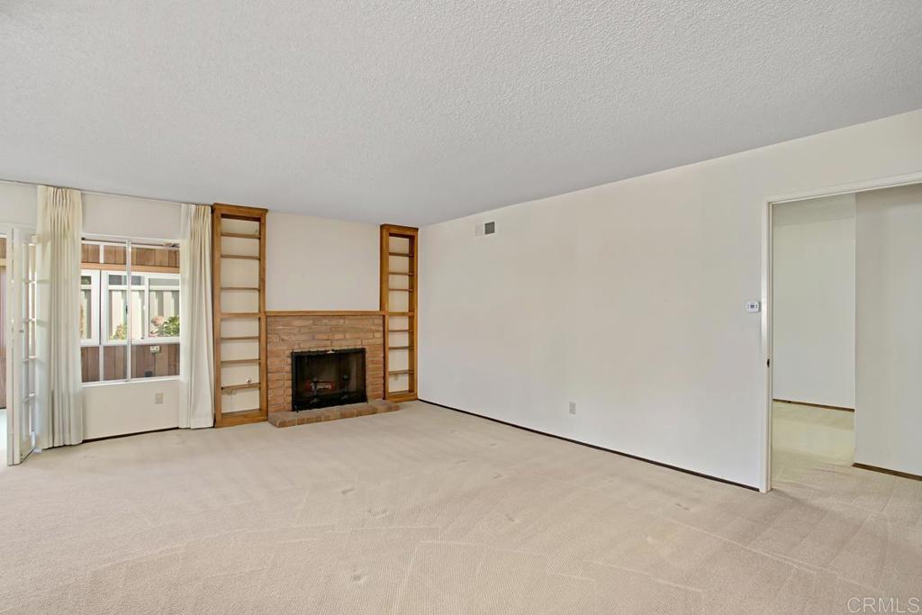 4202 Dawn Lane Oceanside, CA 92056 - Photo 4 of 23 a view of a livingroom with a fireplace