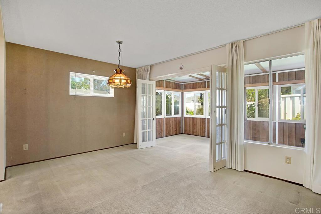 4202 Dawn Lane Oceanside, CA 92056 - Photo 9 of 23 a view of an empty room with a window