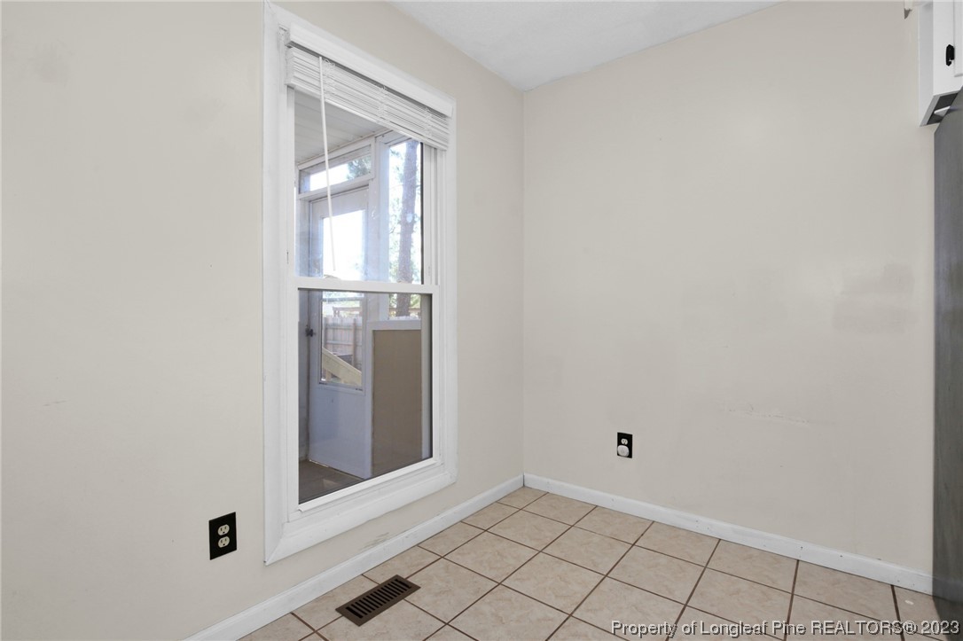 3675 Applegate Road Hope Mills, NC 28348 - Photo 14 of 32 a view of an empty room with window