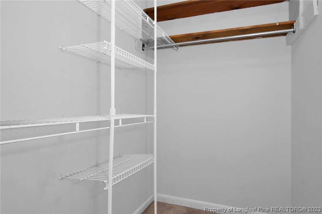 3675 Applegate Road Hope Mills, NC 28348 - Photo 19 of 32 a view of an empty walk in closet