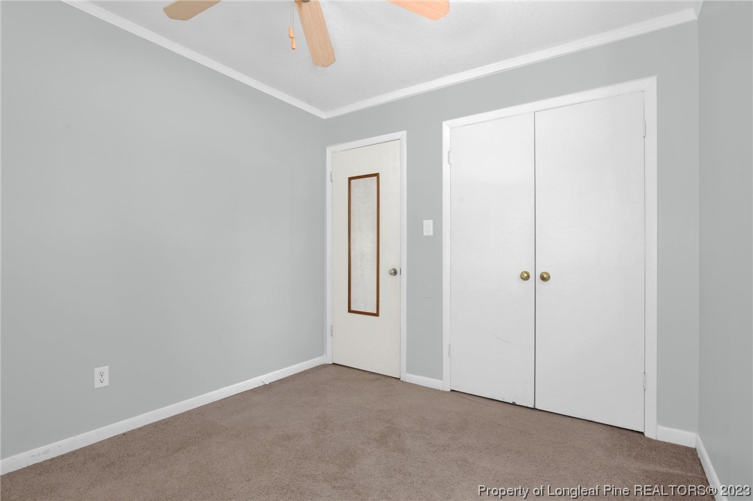 3675 Applegate Road Hope Mills, NC 28348 - Photo 21 of 32 an empty room with windows and closet