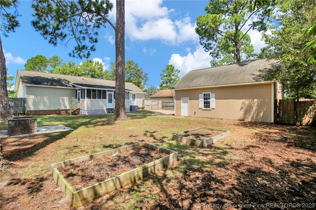 3675 Applegate Road Hope Mills, NC 28348 - Photo 31 of 32 front view of a house with a yard