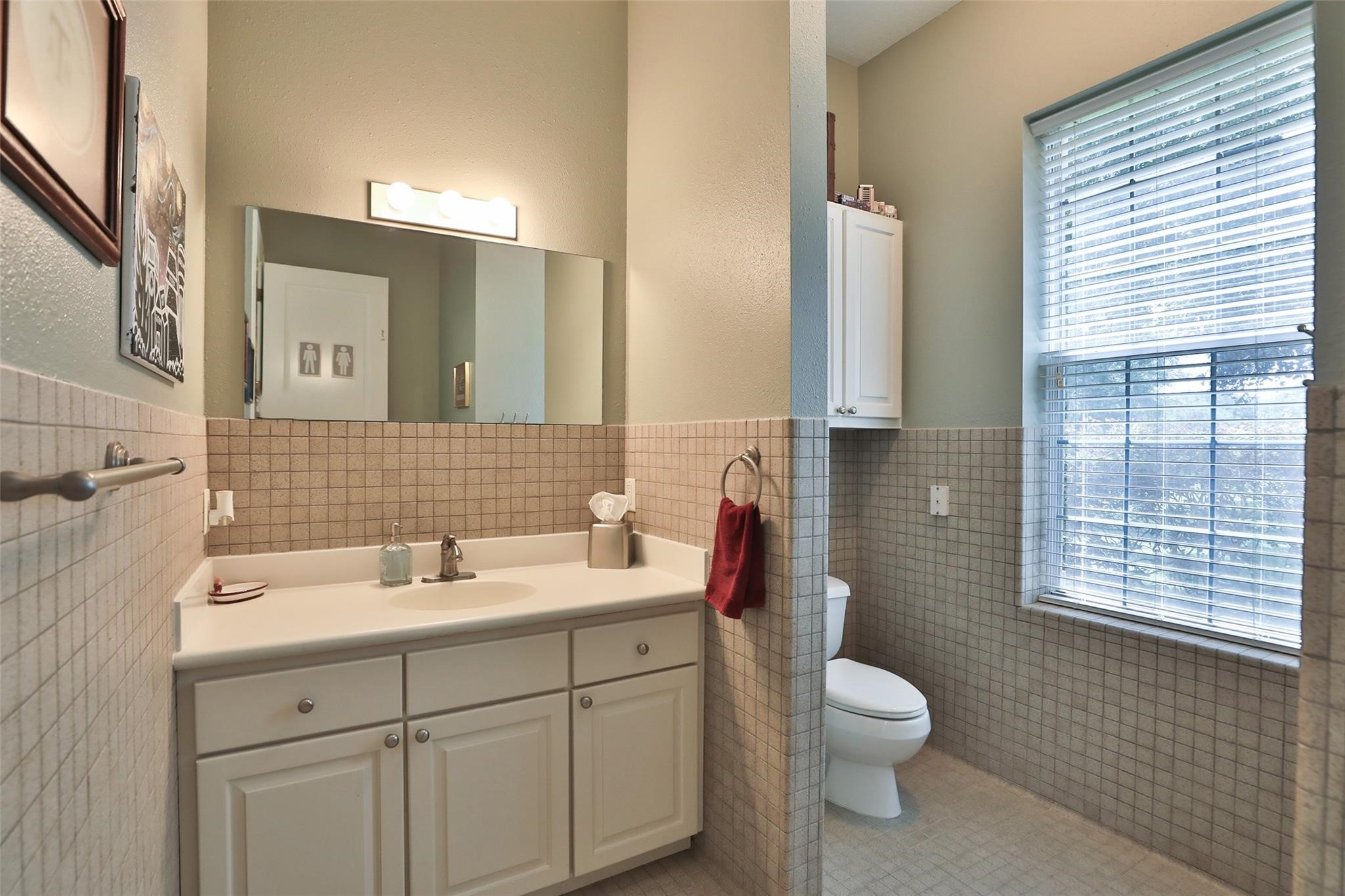 12126 Zion Road Tomball, TX 77375 - Photo 30 of 50 This garage bathroom is both practical and thoughtfully designed with a full shower making it a perfect addition to the ultimate workshop, showroom, or man cave.