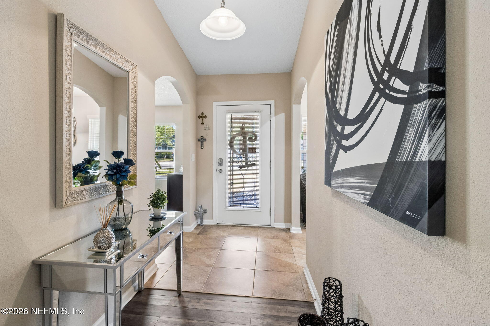 96034 Bass Lane Yulee, FL 32097 - Photo 11 of 50 a view of an entryway with wooden floor