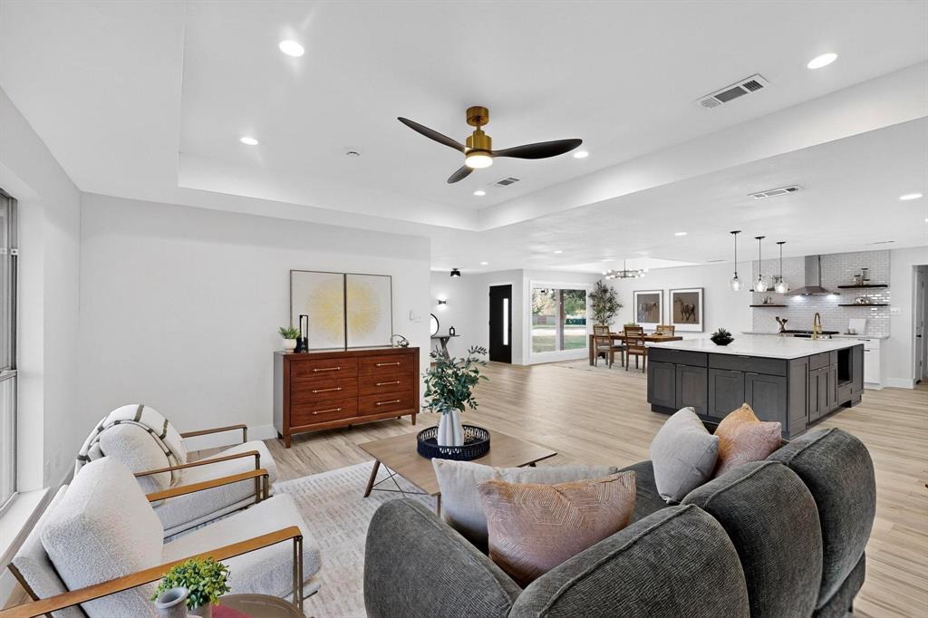 1808 Greenwood Road McKinney, TX 75069 - Photo 1 of 40 a living room with furniture and kitchen view