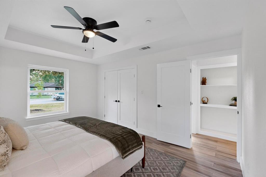 1808 Greenwood Road McKinney, TX 75069 - Photo 21 of 40 a bedroom with a bed and a window