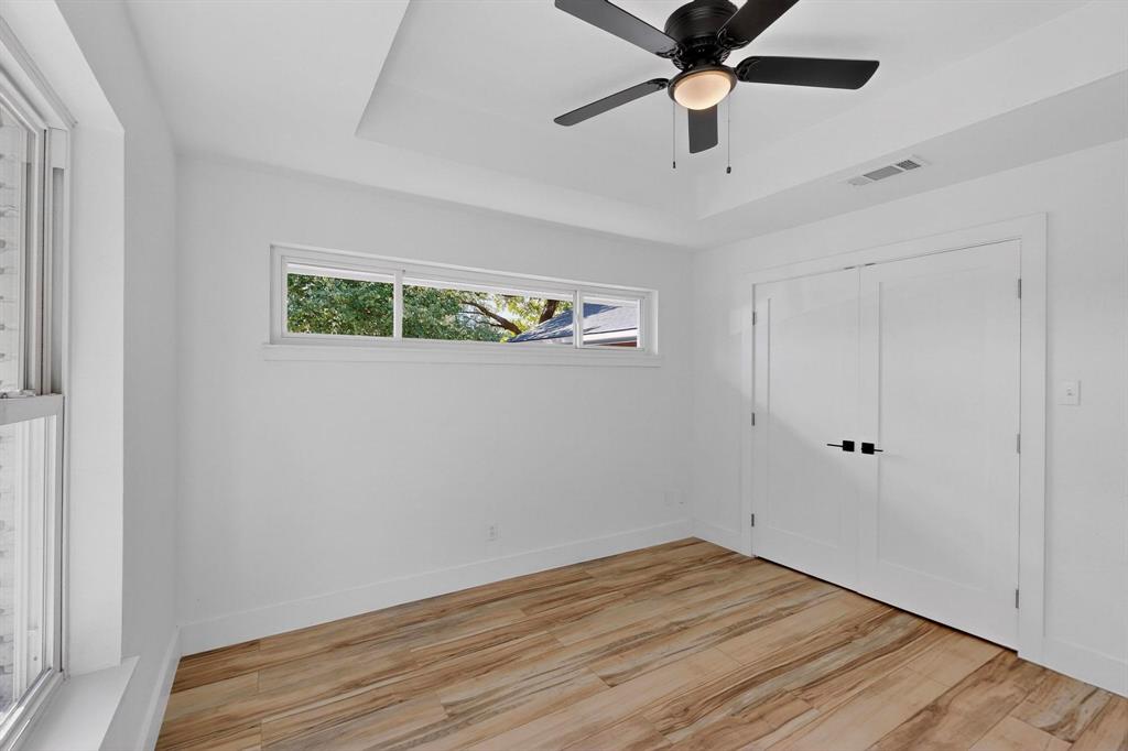 1808 Greenwood Road McKinney, TX 75069 - Photo 32 of 40 wooden floor in an empty room with a window