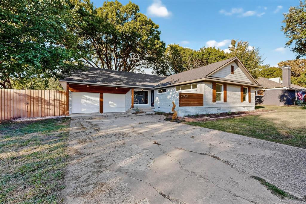 1808 Greenwood Road McKinney, TX 75069 - Photo 40 of 40 a front view of a house with a yard and garage
