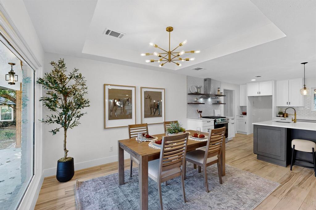 1808 Greenwood Road McKinney, TX 75069 - Photo 9 of 40 a view of a workspace with furniture and a kitchen