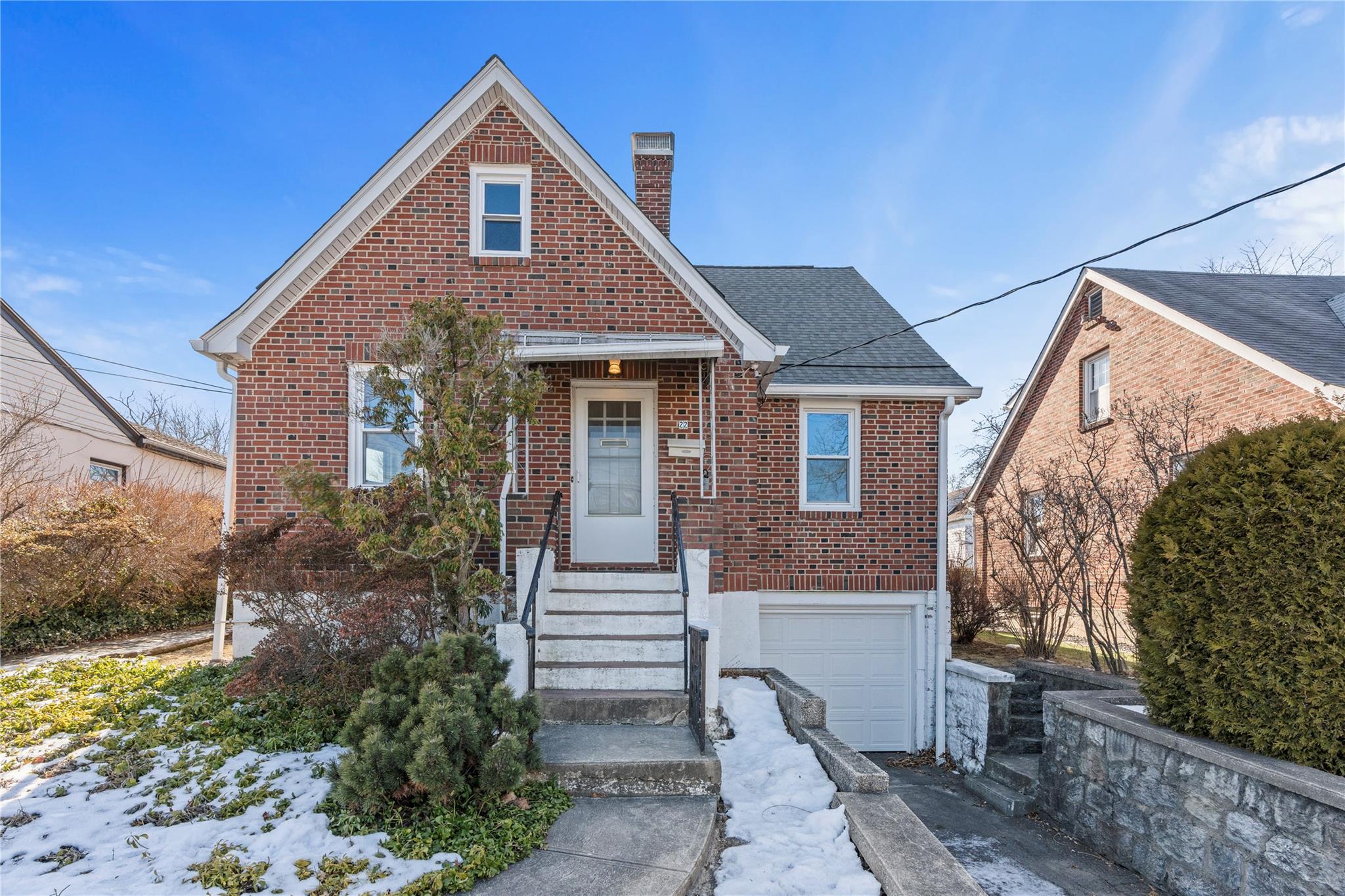 View of front of house with a garage