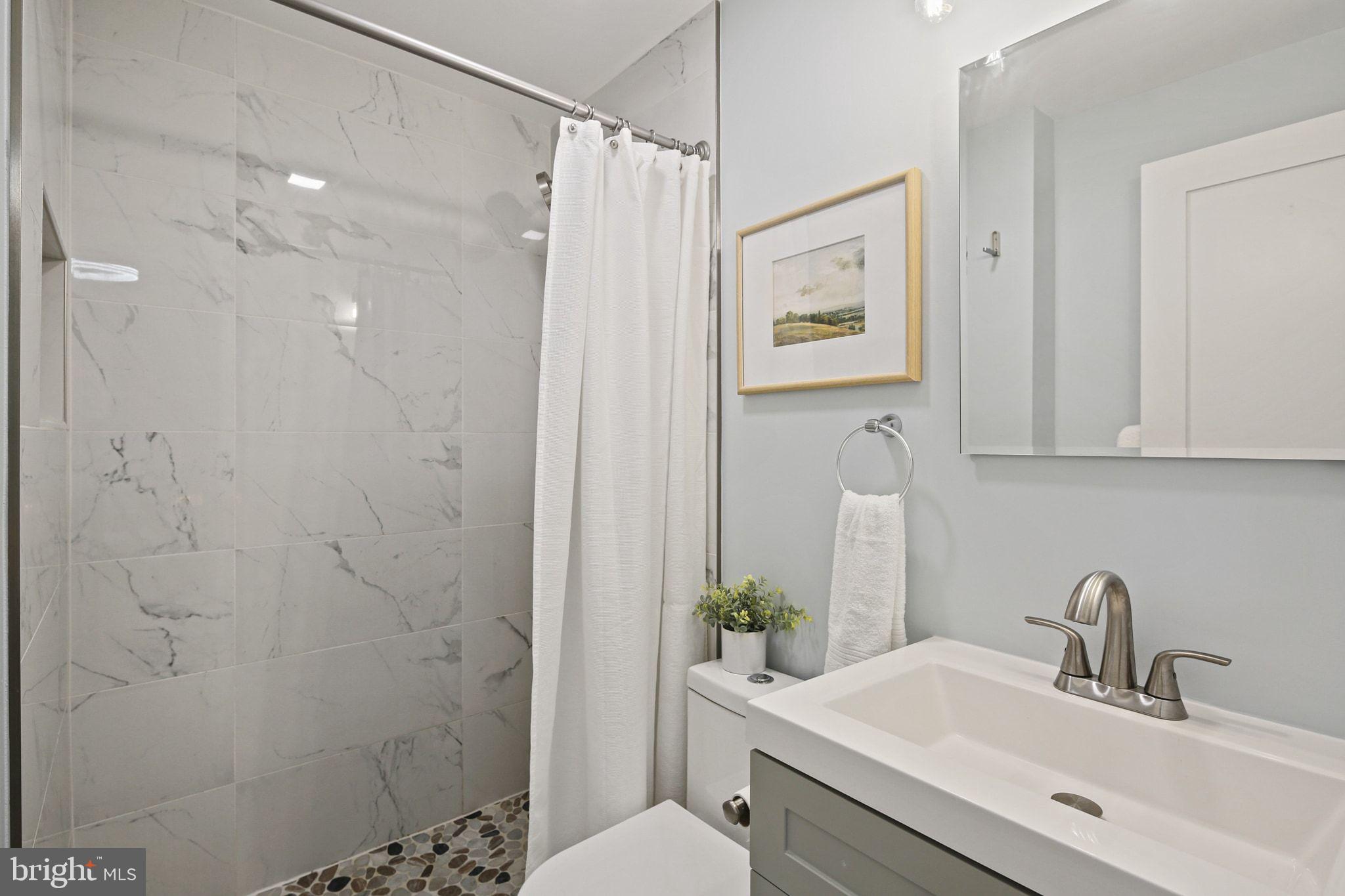 2300 Homestead Drive Silver Spring, MD 20902 - Photo 15 of 37 Primary Ensuite- Renovated 2024