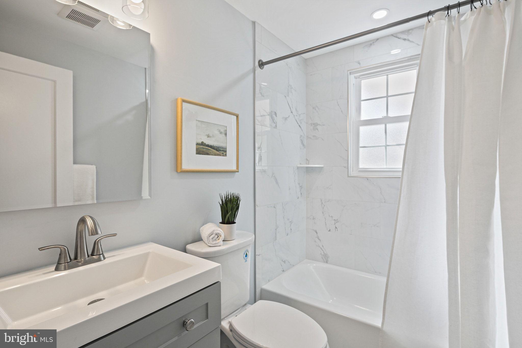 2300 Homestead Drive Silver Spring, MD 20902 - Photo 18 of 37 Renovated Hall Bathroom- 2025