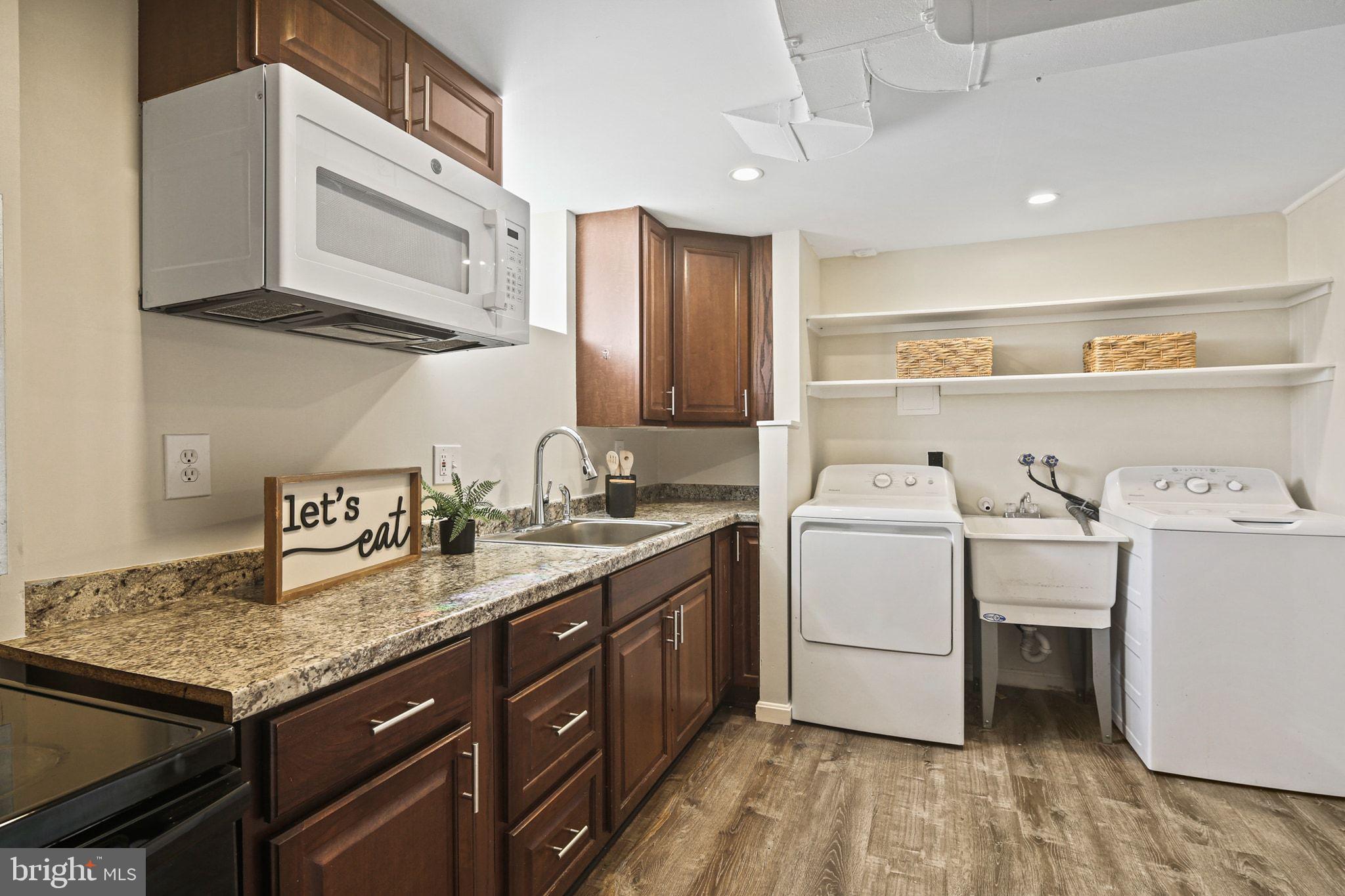 2300 Homestead Drive Silver Spring, MD 20902 - Photo 23 of 37 Lower Level Kitchen- Luxury Vinyl Floor