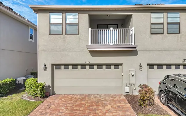 a view of a house with a door and a window
