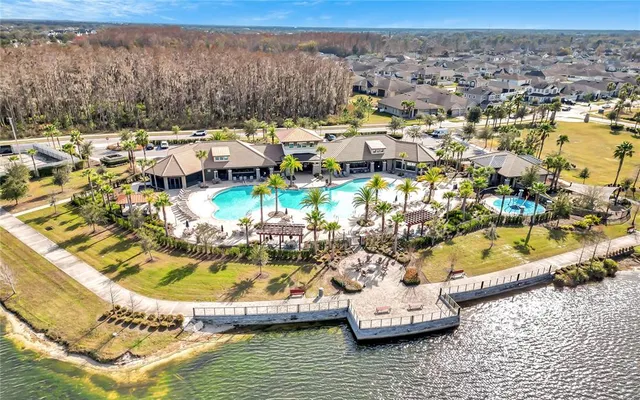 a view of a swimming pool with an ocean view