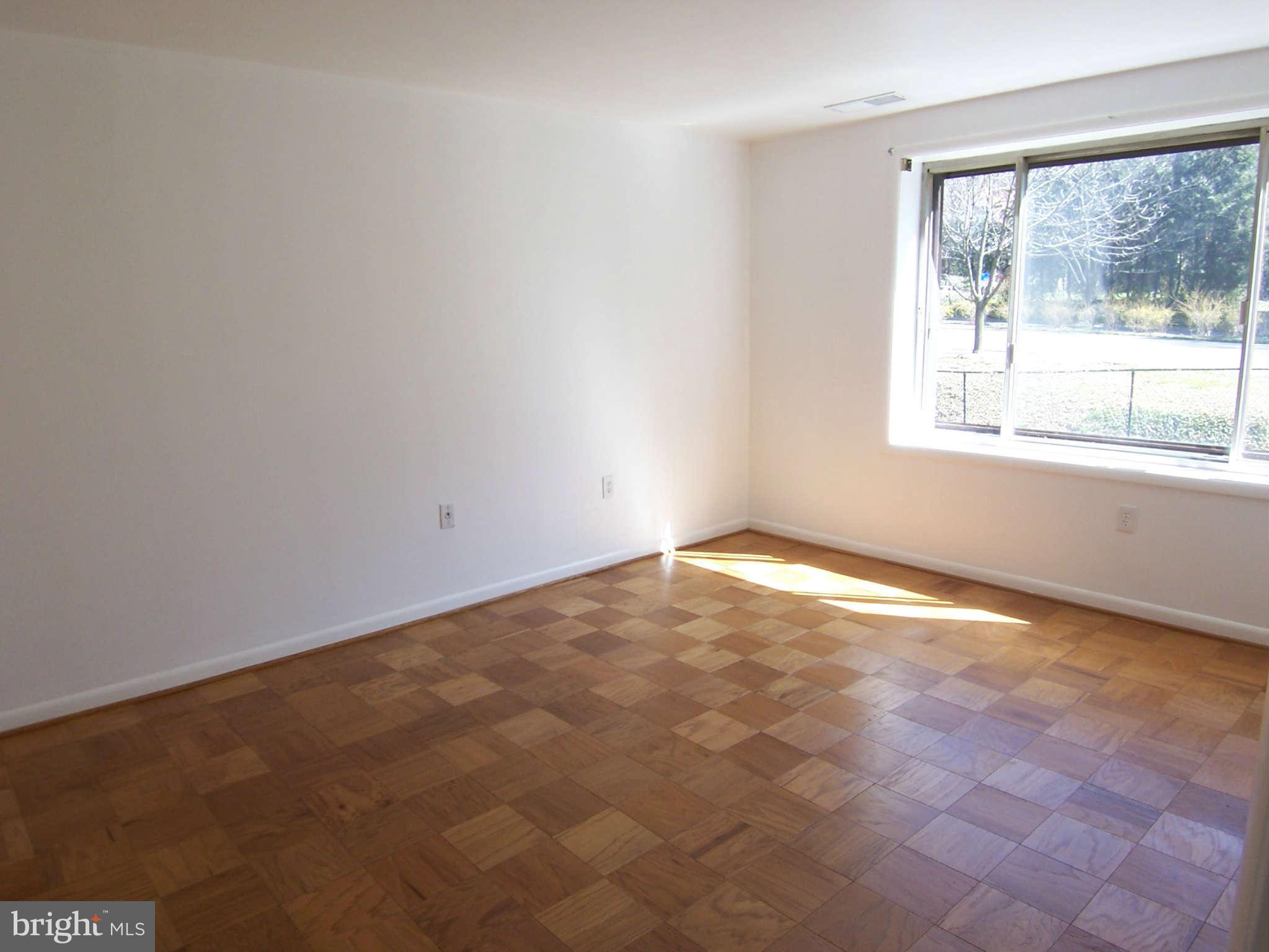5 Cross Keys Road, Unit 5D Baltimore, MD 21210 - Photo 10 of 16 an empty room with a window