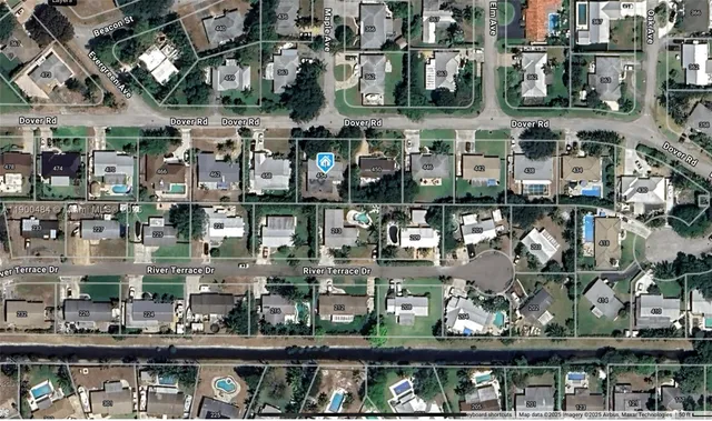 a store area with lots of different kinds of fruit and vegetables