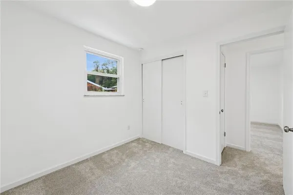 an empty room with windows