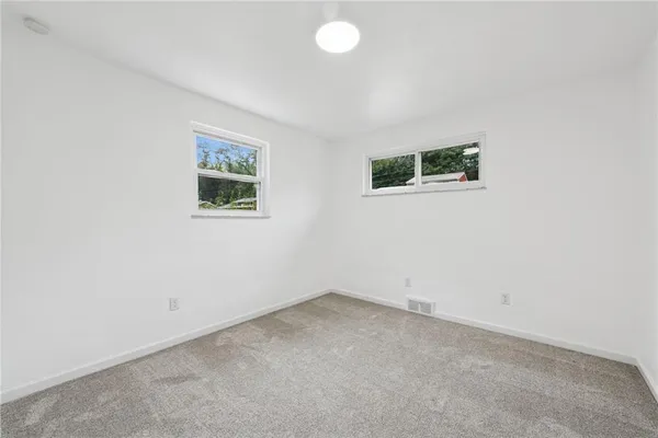 an empty room with a workspace