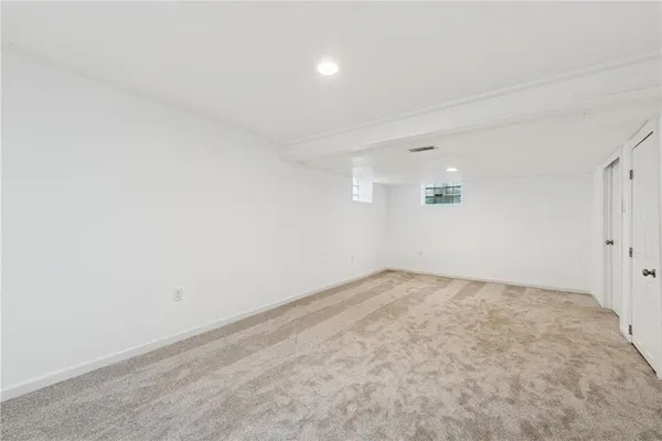 an empty room with a natural light