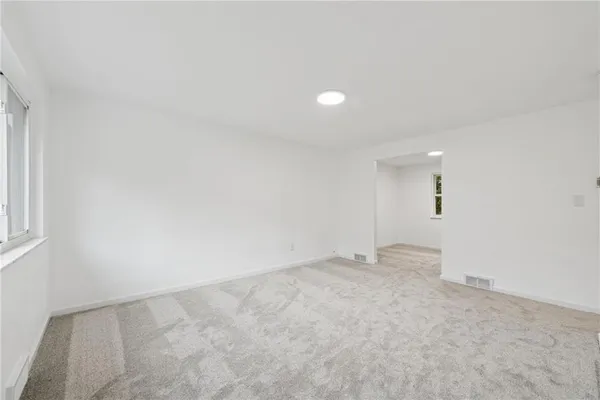 an empty room with an entryway