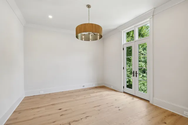 a aerial view of a house with swimming pool and garden