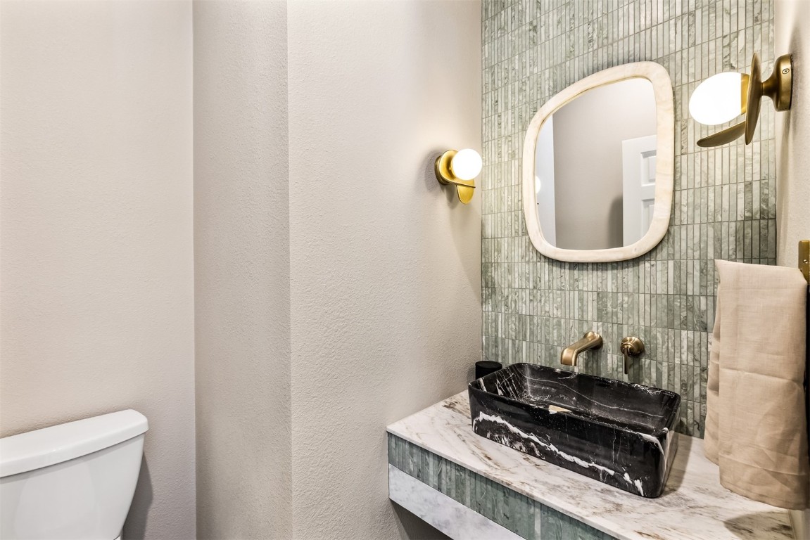21 Stormwatch Circle Silverthorne, CO 80498 - Photo 15 of 43 a bathroom with a sink and a mirror