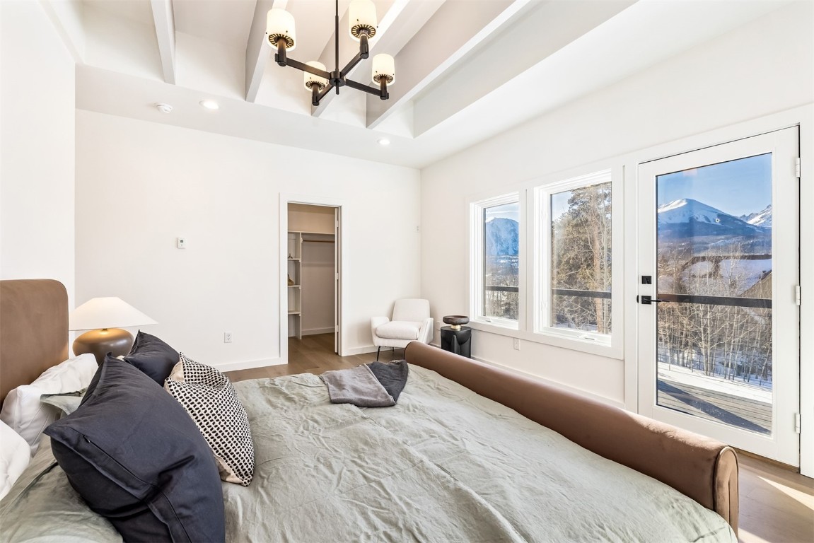 21 Stormwatch Circle Silverthorne, CO 80498 - Photo 17 of 43 a bedroom with a large bed and a window