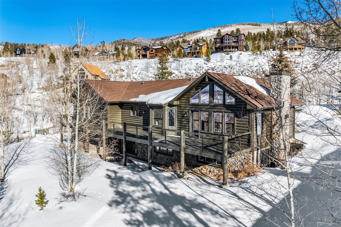 21 Stormwatch Circle Silverthorne, CO 80498 - Photo 32 of 43 a view of a house with wooden fence