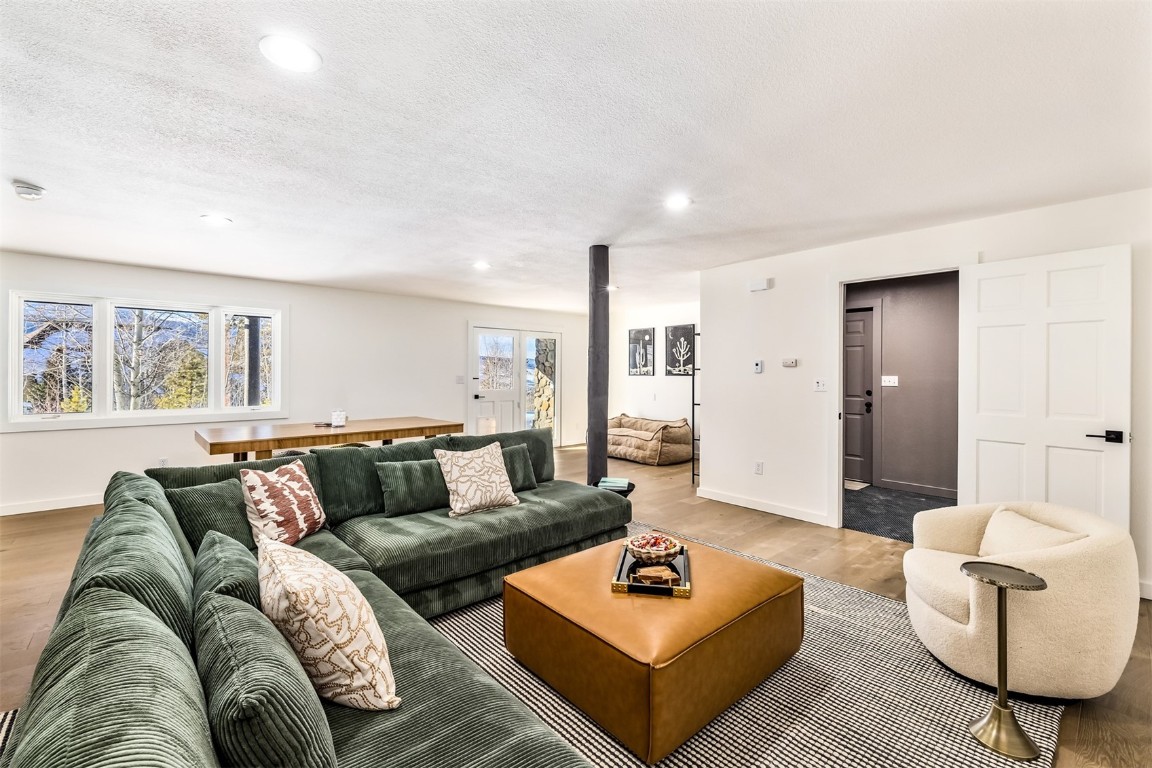 21 Stormwatch Circle Silverthorne, CO 80498 - Photo 33 of 43 a living room with furniture rug and window