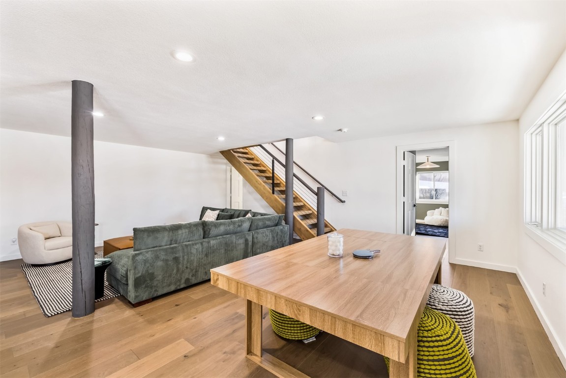 21 Stormwatch Circle Silverthorne, CO 80498 - Photo 39 of 43 a living room with furniture and a wooden floor