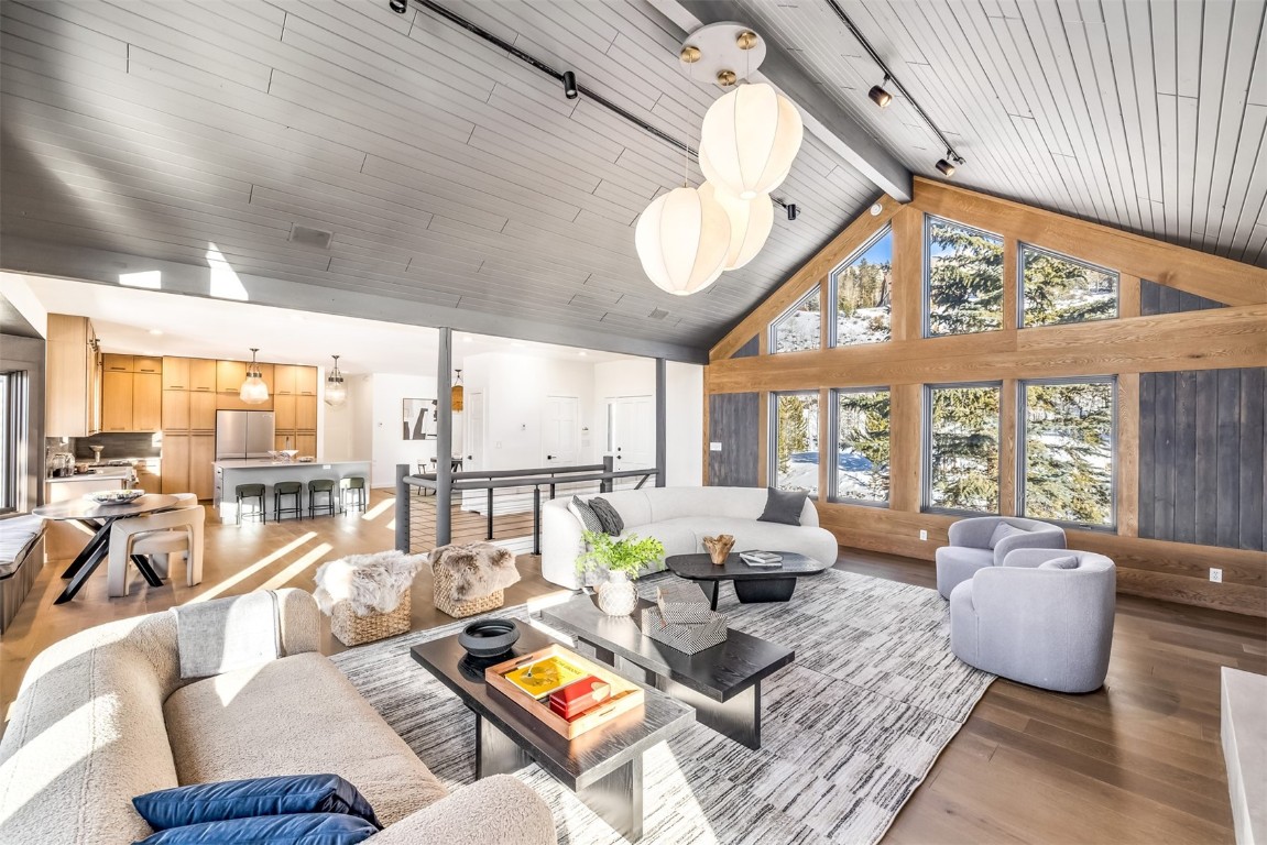 21 Stormwatch Circle Silverthorne, CO 80498 - Photo 7 of 43 a living room with furniture and a large window