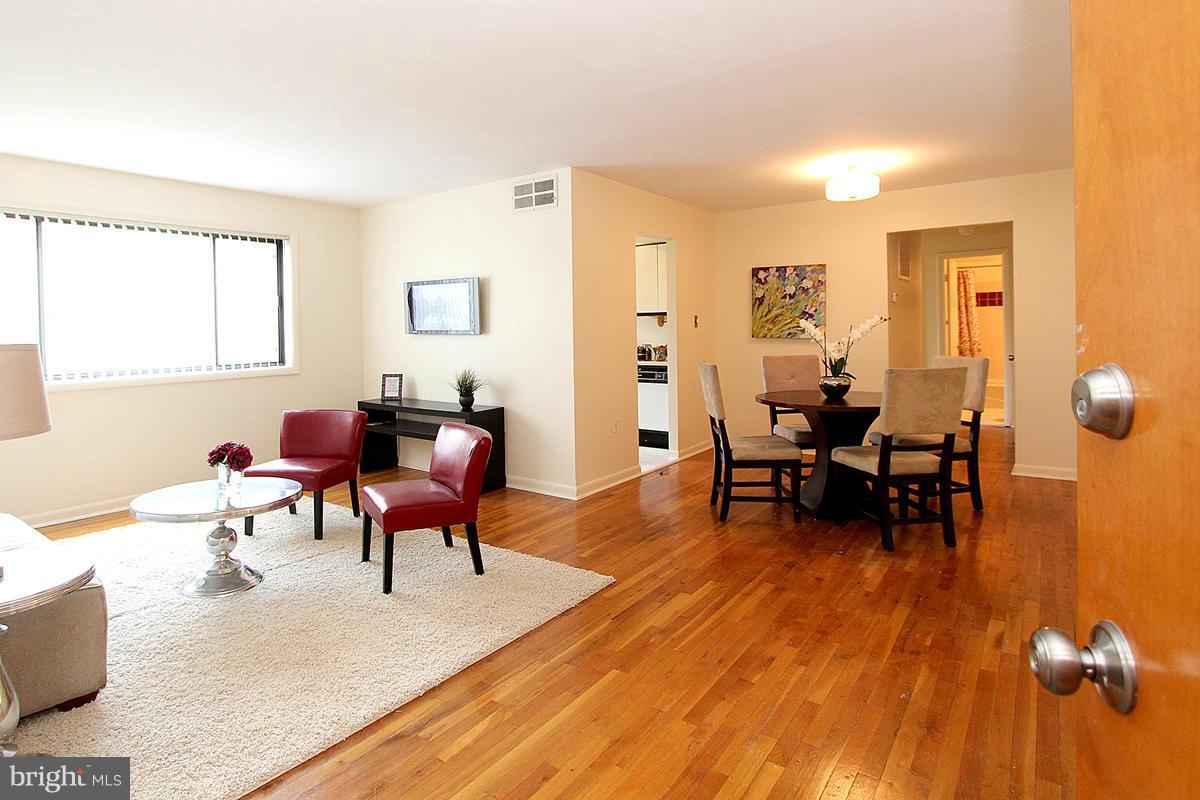 11514 Bucknell Drive, Unit 101 Silver Spring, MD 20902 - Photo 2 of 30 Living Room