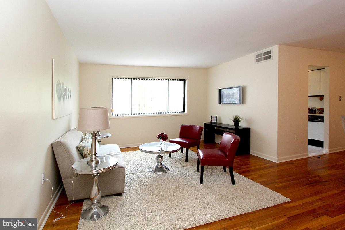 11514 Bucknell Drive, Unit 101 Silver Spring, MD 20902 - Photo 4 of 30 Living Room