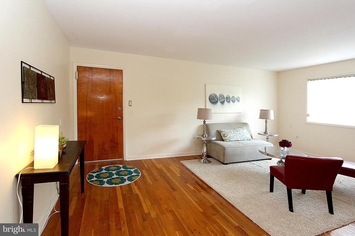 11514 Bucknell Drive, Unit 101 Silver Spring, MD 20902 - Photo 7 of 30 Living Room