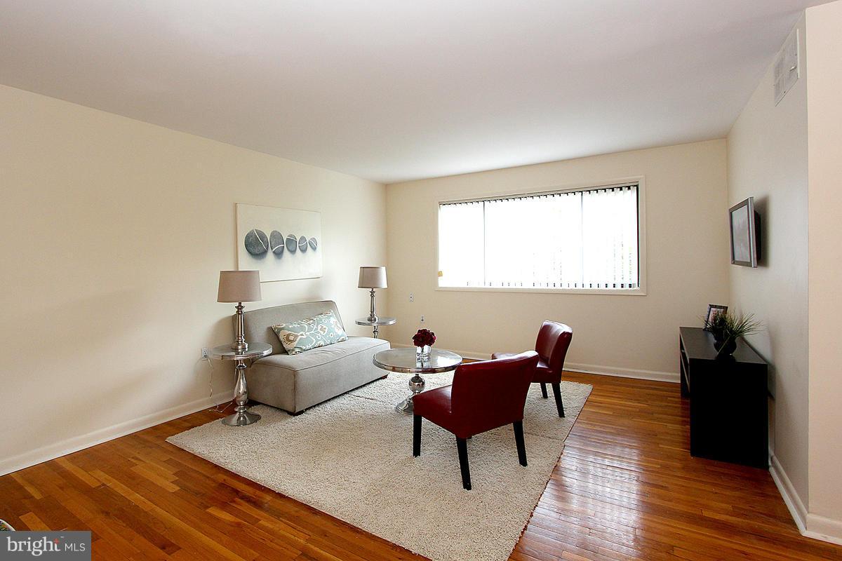 11514 Bucknell Drive, Unit 101 Silver Spring, MD 20902 - Photo 8 of 30 Living Room