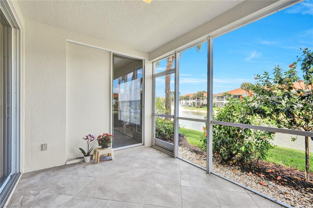23731 Old Port Road, Unit 103 Estero, FL 34135 - Photo 15 of 30 a view of an entryway with garden