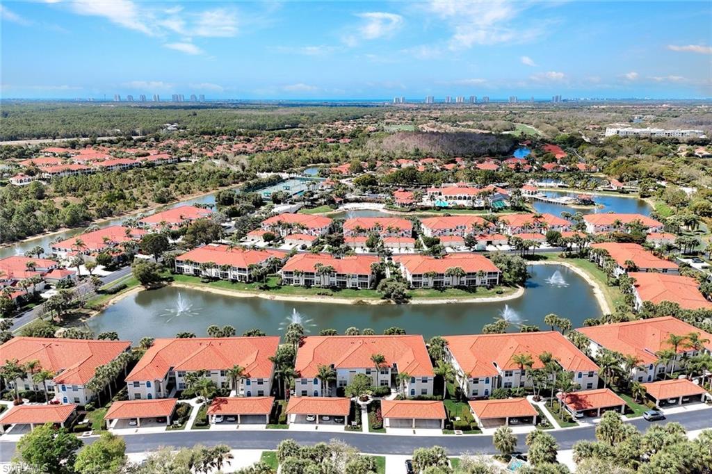 23731 Old Port Road, Unit 103 Estero, FL 34135 - Photo 19 of 30 an aerial view of residential houses with outdoor space