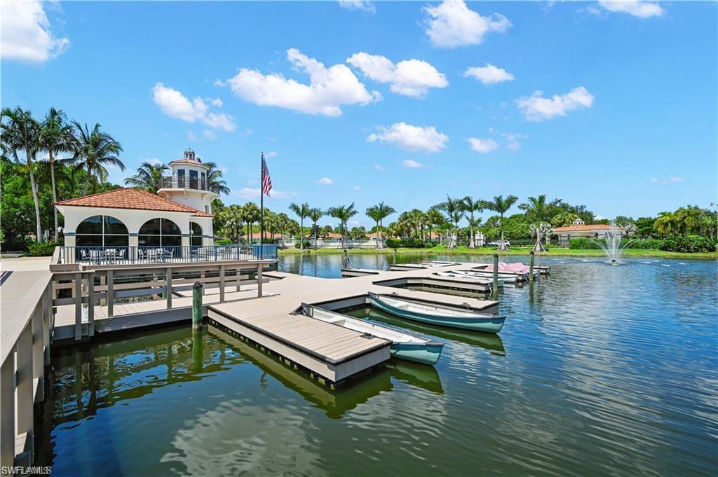23731 Old Port Road, Unit 103 Estero, FL 34135 - Photo 26 of 30 a view of a chairs and table in the terrace