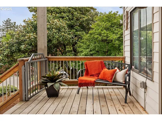 a view of roof deck with furniture