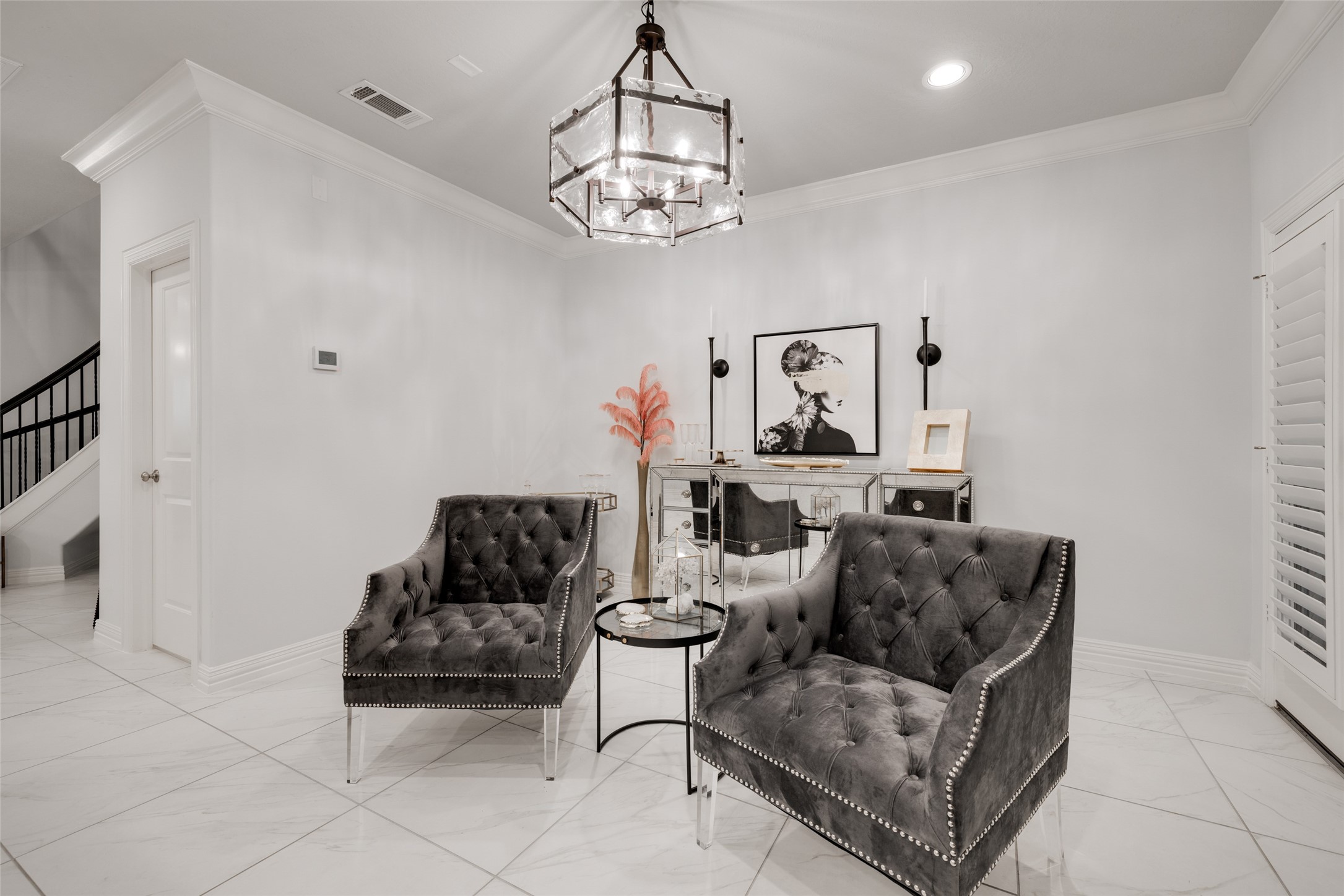 13611 Teal Bluff Lane Houston, TX 77077 - Photo 14 of 46 a living room with furniture and a chandelier