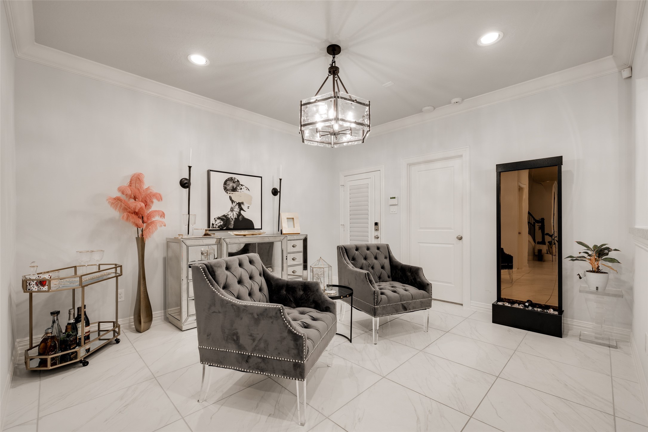 13611 Teal Bluff Lane Houston, TX 77077 - Photo 15 of 46 a view of a livingroom with furniture and a chandelier