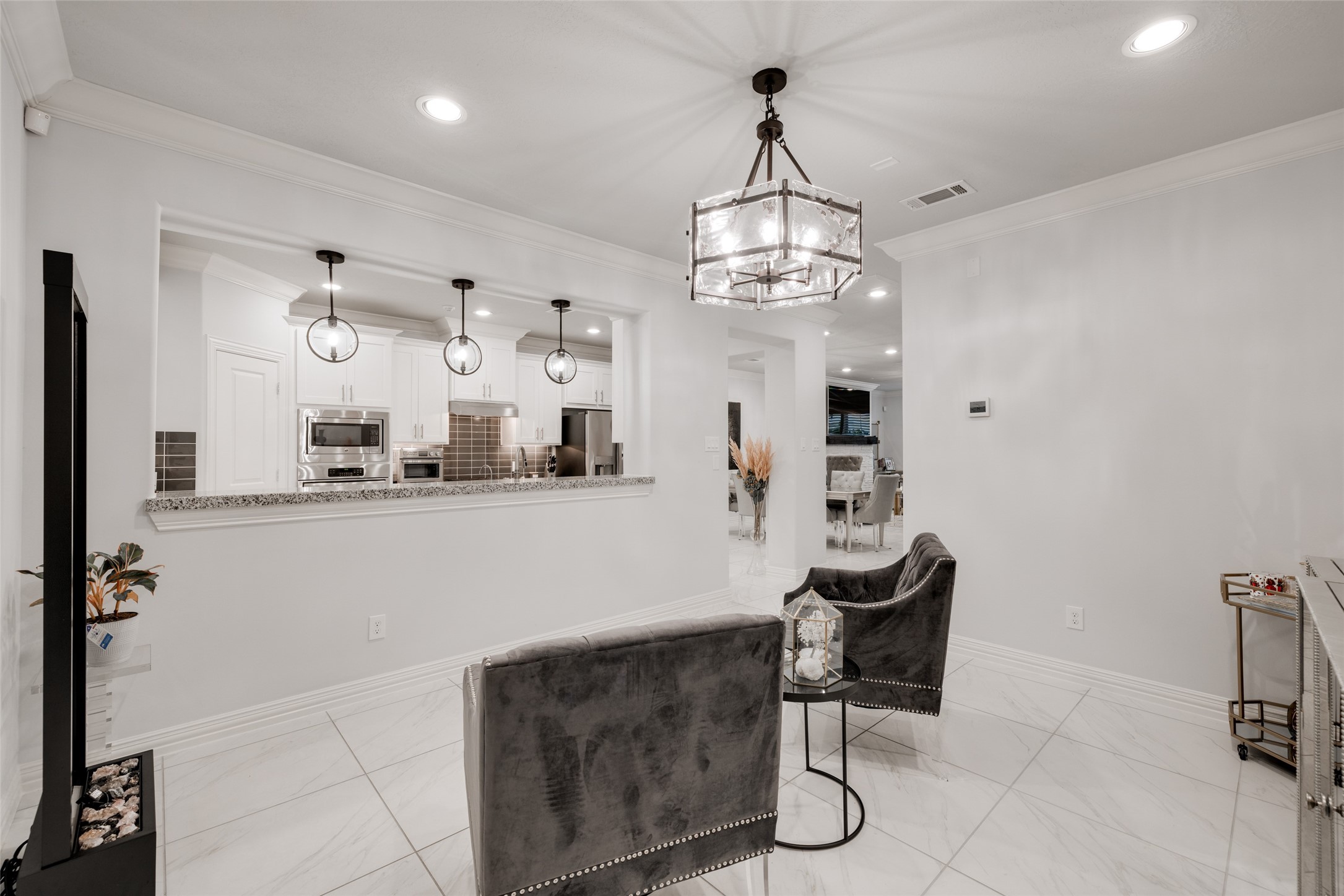 13611 Teal Bluff Lane Houston, TX 77077 - Photo 17 of 46 a view of a kitchen and dining room