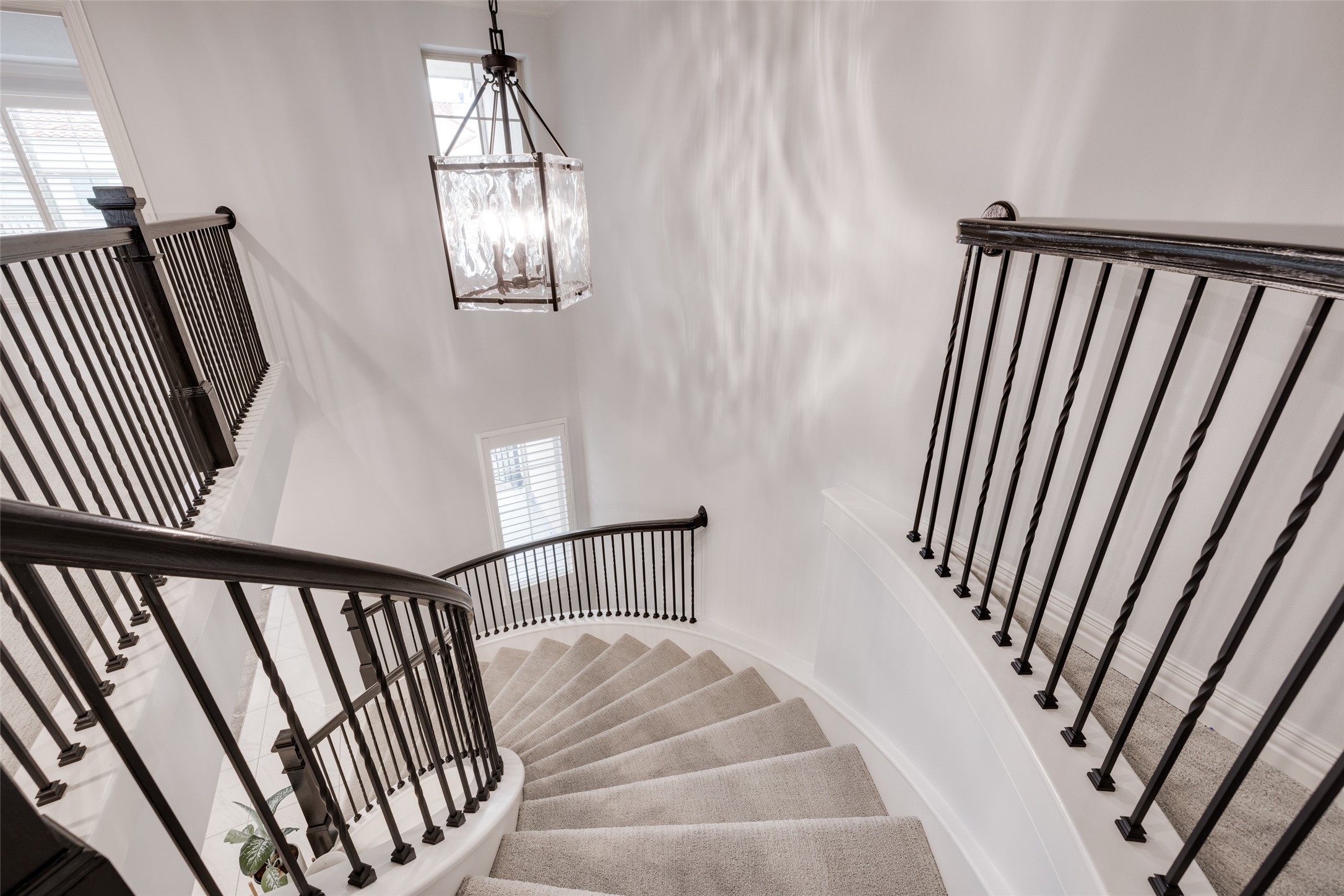 13611 Teal Bluff Lane Houston, TX 77077 - Photo 27 of 46 a view of staircase with railing and white walls