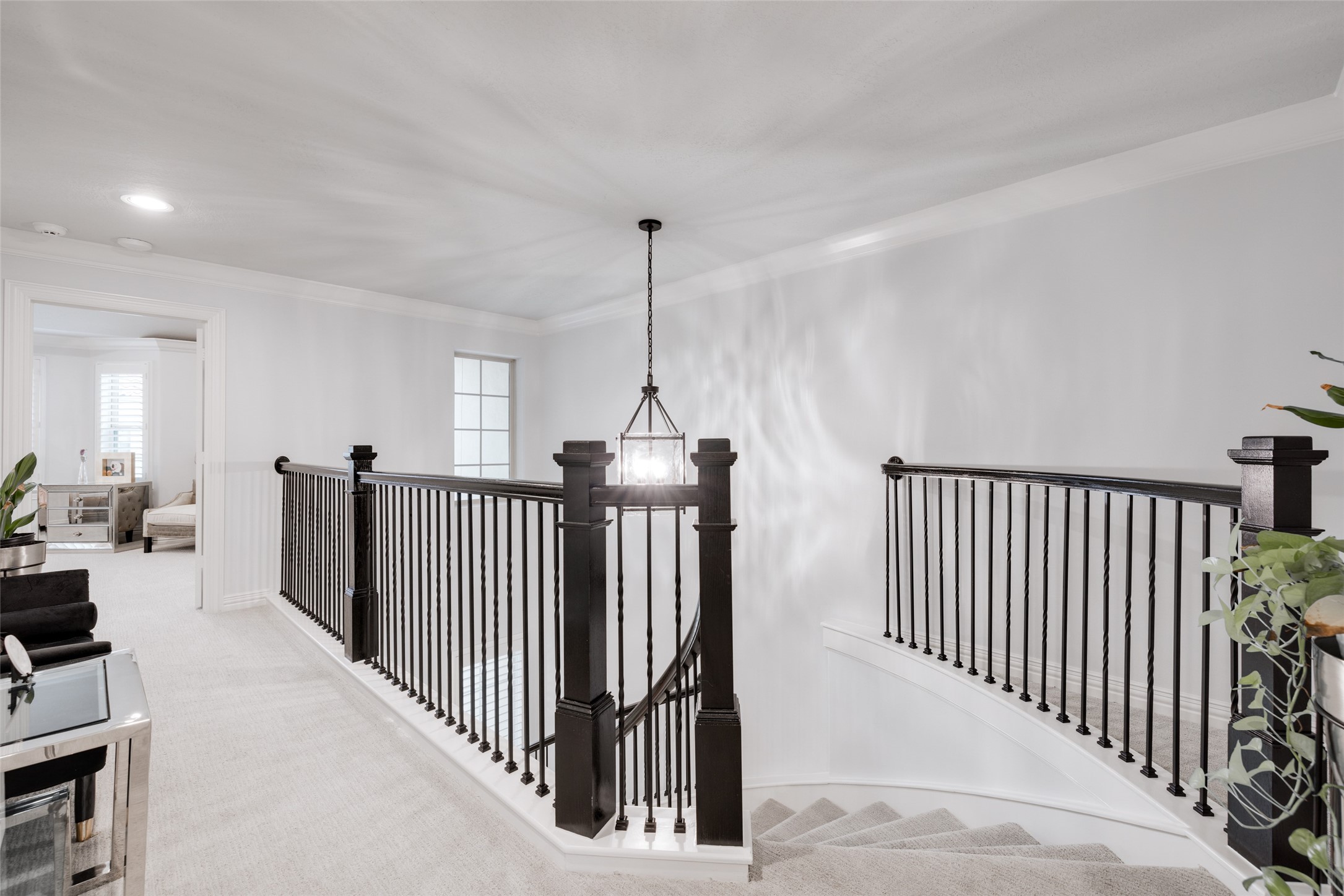 13611 Teal Bluff Lane Houston, TX 77077 - Photo 28 of 46 a view of a hallway with window and stairs