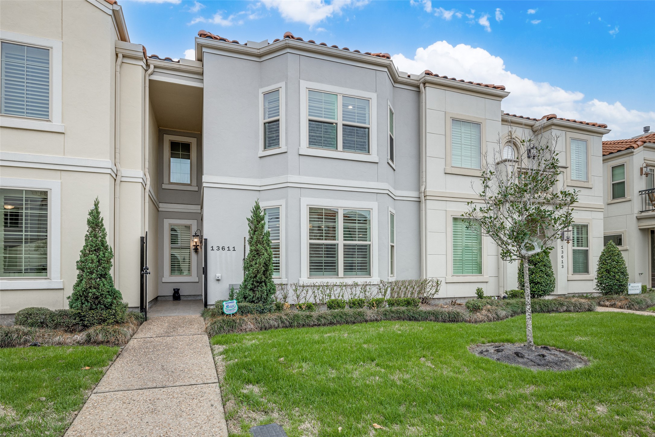 13611 Teal Bluff Lane Houston, TX 77077 - Photo 3 of 46 front view of house with a yard