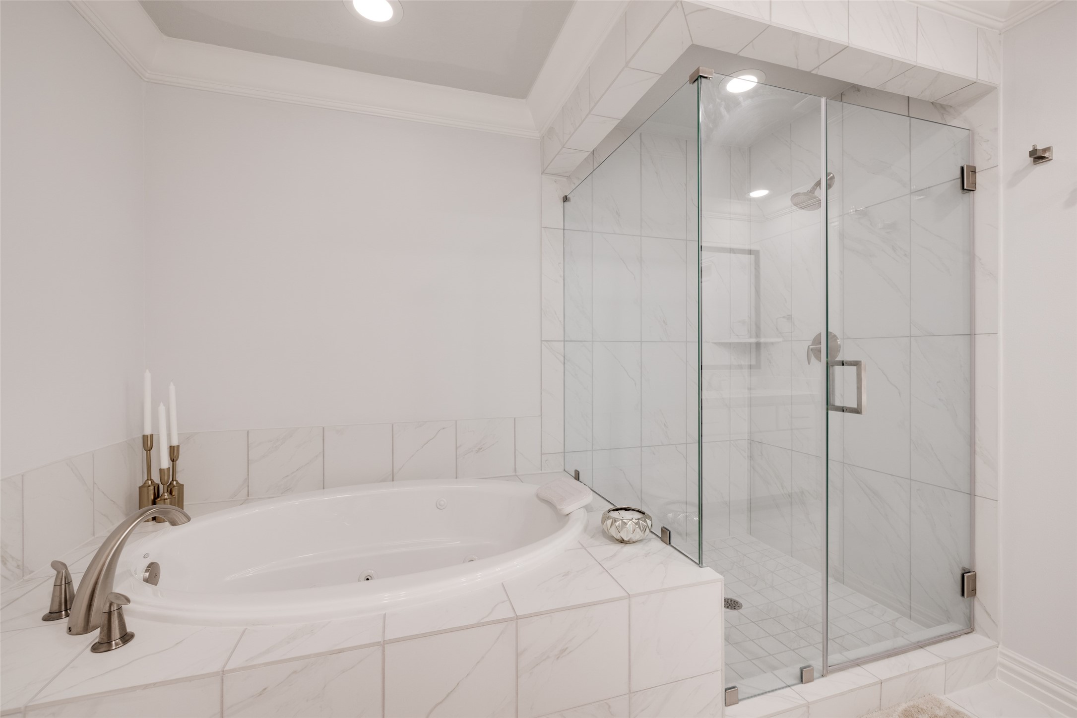 13611 Teal Bluff Lane Houston, TX 77077 - Photo 33 of 46 a white bath tub sitting next to a shower