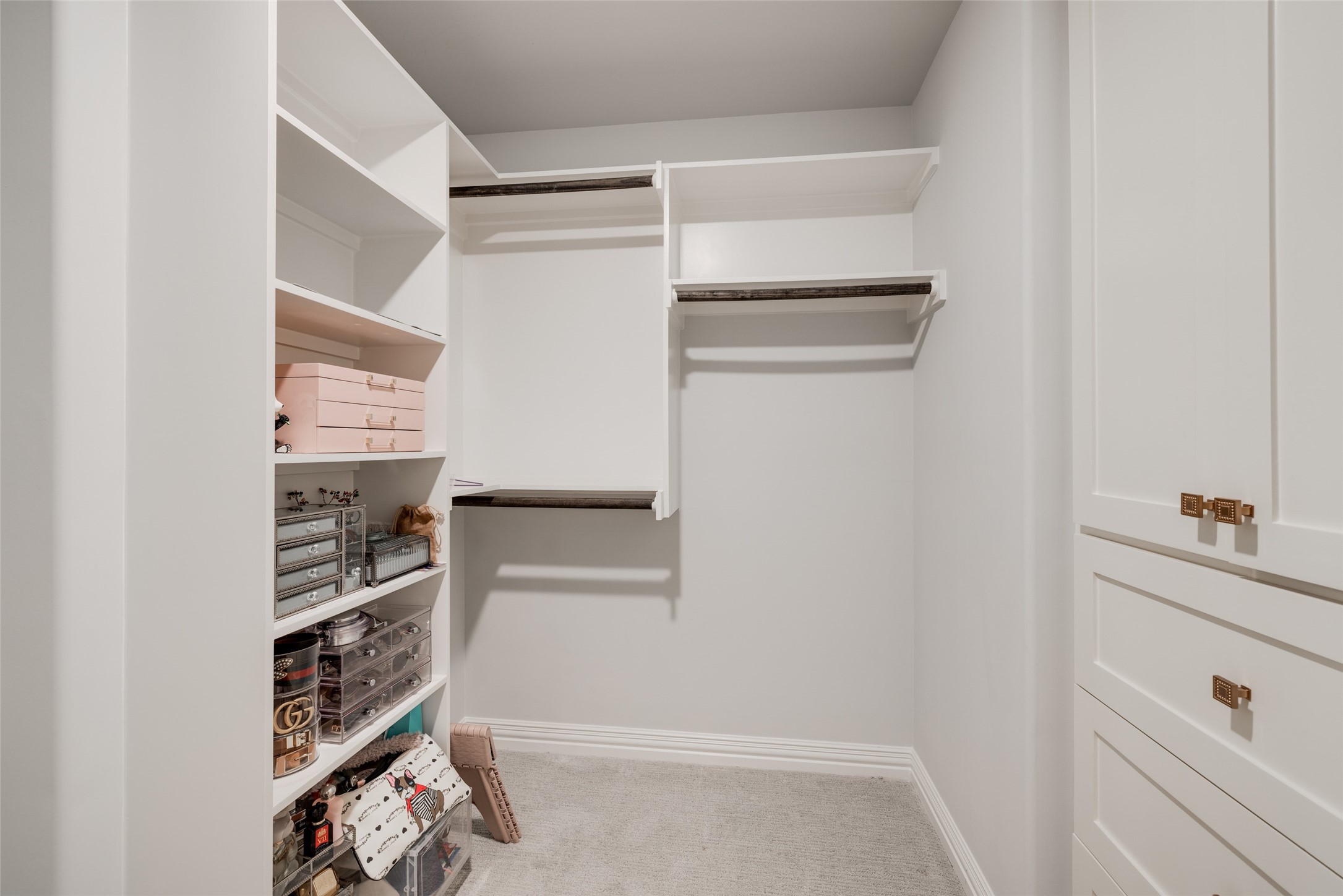 13611 Teal Bluff Lane Houston, TX 77077 - Photo 36 of 46 a view of walk in closet with empty racks